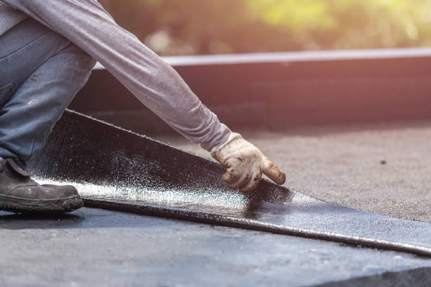 Professional Basement Waterproofing technician working in Plevna, KS